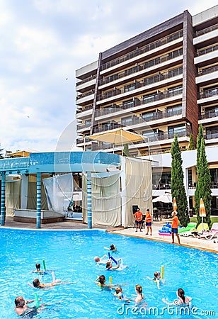 People swim in pool and doing water aerobics. Hotel Flamingo Hotel. Albena Editorial Stock Photo