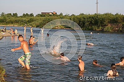 People swim in the river Editorial Stock Photo