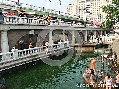 People swimming in a fountain, Alexander Gardens, Moscow, Russia Editorial Stock Photo