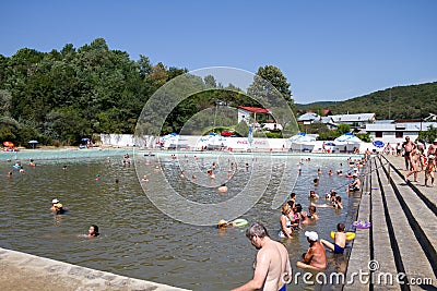 People swimming in public pool Editorial Stock Photo