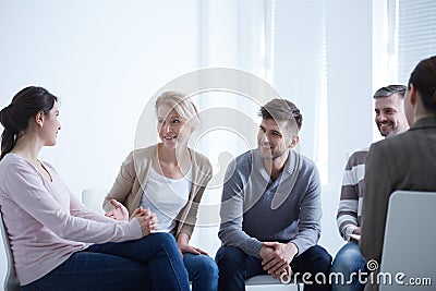 People talking in circle Stock Photo