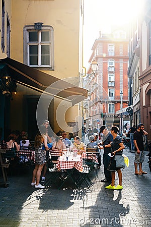 People terrace 6 Rue du Vieux Seigle eating at L`Epicerie Editorial Stock Photo