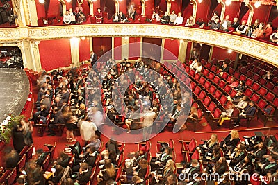 People in theatre hall at graduation show for collage. National Theatre in Iasi, Romania Editorial Stock Photo