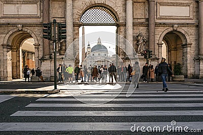 People tourist crowd walking on crosswalk in rome historical city center,italy Editorial Stock Photo