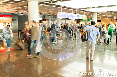 People tourists with travel suitcase, blurred speed motion, Frankfurt, Germany Editorial Stock Photo