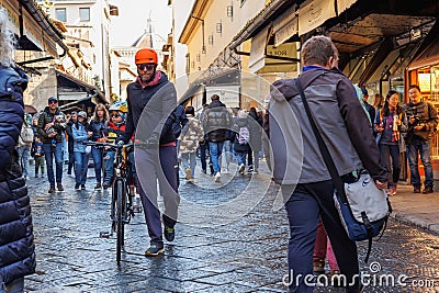 People and Tourists walking along the Main Streets of Florence by day, Italy Editorial Stock Photo