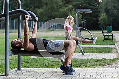 People training on the outdoor gym Stock Photo