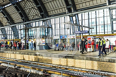 People travel at Alexanderplatz subway station in Berlin Editorial Stock Photo
