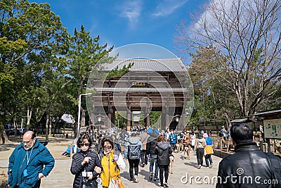 People traveler, group tour, local people, Japanese people visited and traveled around Todaiji Temple at the afternoon, Nara Editorial Stock Photo