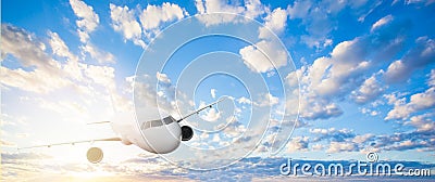 People travelling concept. Plane on skyline. Airplane, blue sky with white clouds Stock Photo