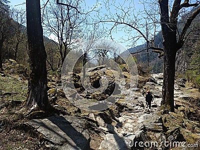 PEOPLE TREKKING IN ROCK MOUNTAINS Editorial Stock Photo