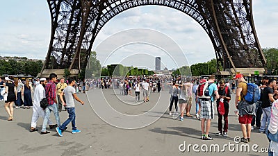 People under the Eiffel Tower, Paris Editorial Stock Photo