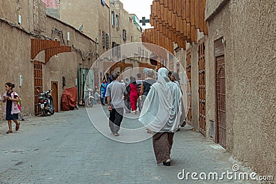 People and urban life in the streets of the medina of Marrakech. Morocco in October 2019 Editorial Stock Photo
