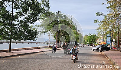 People and vehicles on street in Kep, Cambodia Editorial Stock Photo