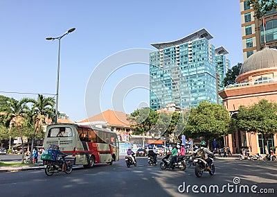 People and vehicles on street in Saigon, Vietnam Editorial Stock Photo