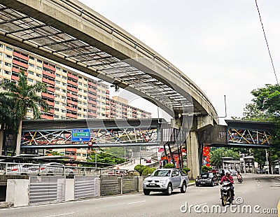 People and vehicles on the street in Singapore Editorial Stock Photo