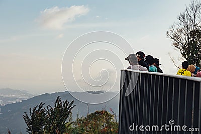 People viewd cityscape and mountain with green from Penang Hill at George Town. Penang, Malaysia Editorial Stock Photo