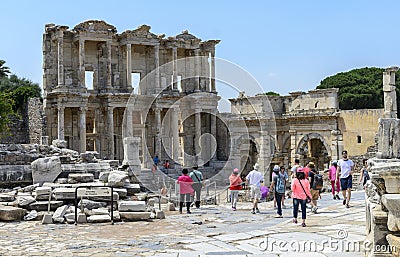 People are visiting The Celsus Library Celcius Library in Ephesus Ancient City. Ephesus is Editorial Stock Photo