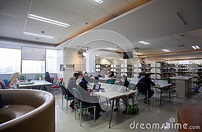 People visiting and studying in National Library (Perpustakaan Nasional) in Jakarta, Indonesia Editorial Stock Photo