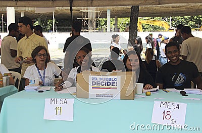 People voting on Venezuelan national consultation called by the National Assembly Editorial Stock Photo