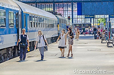 People wait in the famous West Train Station in Budapest Editorial Stock Photo