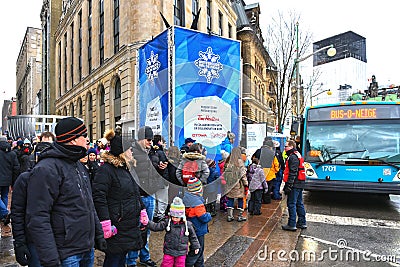 People wait in line for Winterlude Festival bus in Ottawa, Canada Editorial Stock Photo