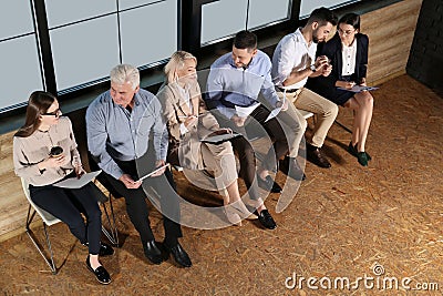 People waiting for job interview in office hall Stock Photo