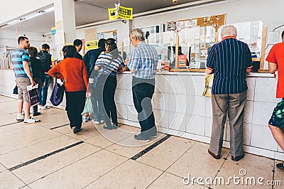 People waiting in line at the Post Office Editorial Stock Photo
