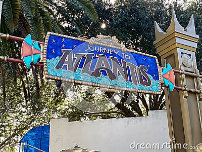 People waiting in line to get on the Journey to Atlantis Roller Coaster water ride at SeaWorld Editorial Stock Photo