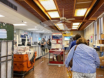 People waiting in line at a United States Post Office Editorial Stock Photo