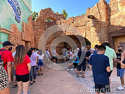 People waiting in a long line at the ticket entrance to Islands of Adventure at Universal Studios Editorial Stock Photo