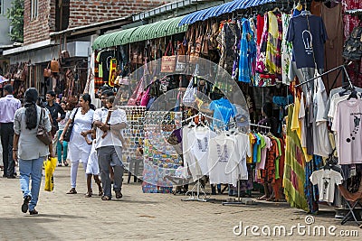 People walk along a street in Pinnawala. Editorial Stock Photo