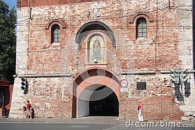 People walk near Dmitrovskaya Tower, Nizhny Novgorod Kremlin Editorial Stock Photo