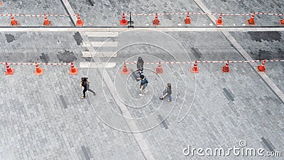 People walk on the pedestrian city street walkway on pavement co Editorial Stock Photo