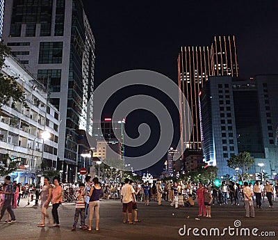 People walk in Saigon on Victory day Editorial Stock Photo