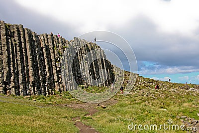 People walking around the Giants Causeway and Cliffs, Northern Ireland Editorial Stock Photo