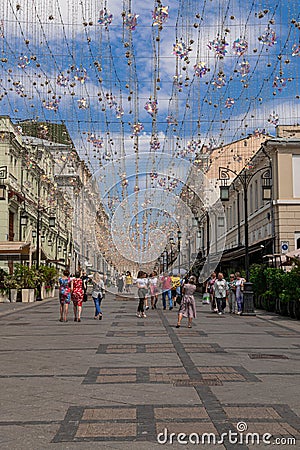 People walking around Kamergerskiy Lane Editorial Stock Photo