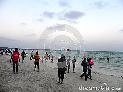 People walking at the beach at the Indian Ocean Mombasa Editorial Stock Photo