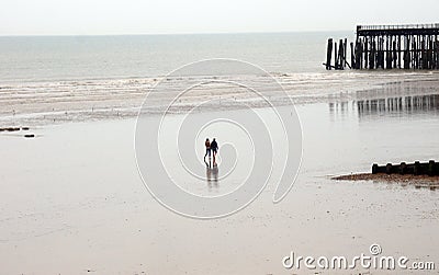 People walking on the big beach Editorial Stock Photo