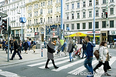 People walking through the central street Editorial Stock Photo