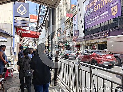 People walking in front of Bata store at Charoen Krung Road Editorial Stock Photo