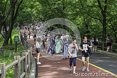 People walking in Namsan Gongwon gil in Seoul Editorial Stock Photo