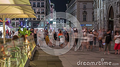 People walking in the Old city center of Vienna in Stephansplatz night timelapse Editorial Stock Photo