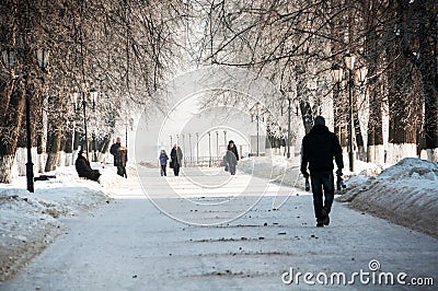 People walking by the park during the cold winter day in Yaroslavl, Russia Editorial Stock Photo