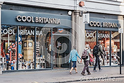 People walking past Cool Brittania souvenirs and gift shop in London, UK Editorial Stock Photo