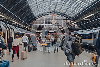 People walking on the platform arrived to St. Pancras Station on Eurostar, London, UK Editorial Stock Photo