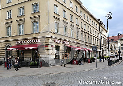 People walking by popular coffee chain Costa Coffee near Castle Square Editorial Stock Photo