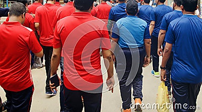 People walking in a rally around a city streets Editorial Stock Photo