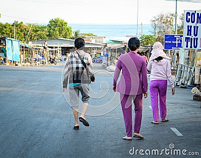 People walking on the road in Nha Trang, Vietnam Editorial Stock Photo