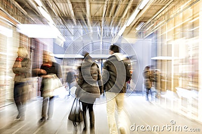 People walking in shopping centre, zoom effect, motion Stock Photo